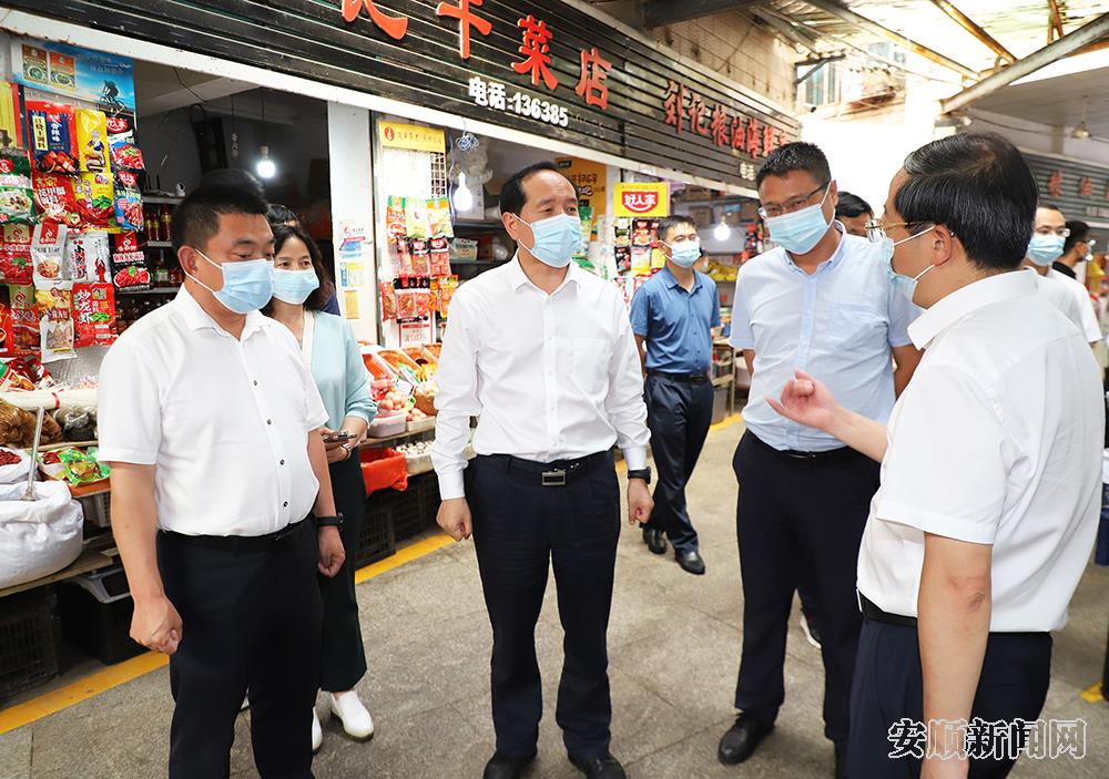 调研平坝区塔南农贸市场创建工作开展情况.JPG